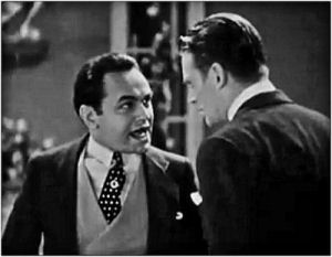  Edward G. Robinson (right) in a cropped screenshot from the trailer for the 1931 film Little Caesar
